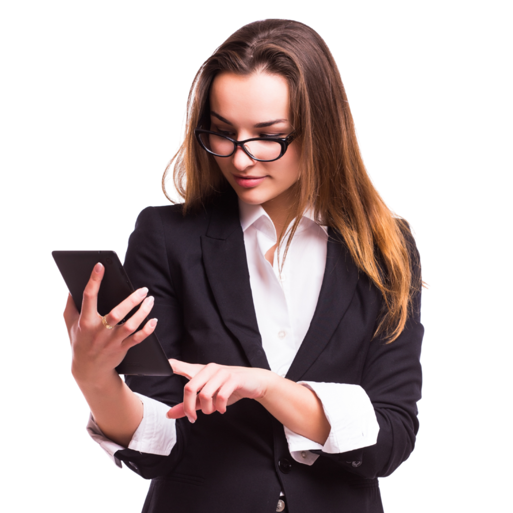 Businesswoman in a blazer and glasses looking down at her smartphone in her hand.